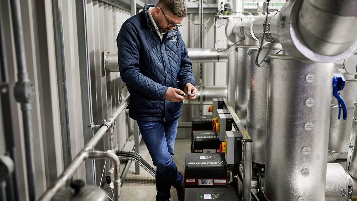 JD Cooling representative checking the Grundfos pump installation serving Softripe at Worldwide Fruit
